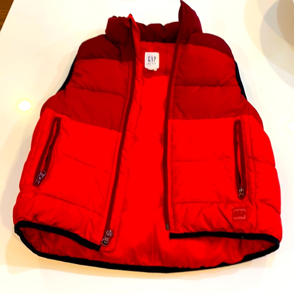 GAP Kids small red puffer vest.